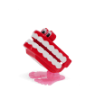Wind-up toy shaped like red chattering teeth with white teeth, googly eyes, and pink feet