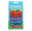 Set of six sausage dog-shaped crayons in yellow, purple, red, blue, green, and orange in packaging.