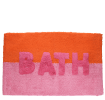 Orange and pink bath mat with the word ‘BATH’ in pink in the center