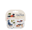 Mini travel case with playful illustrated dogs and trees on a light background