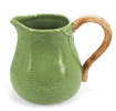 Green ceramic jug with textured surface and a curved brown handle