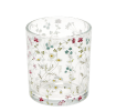 Clear glass candle holder with delicate floral design 