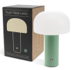 USB lamp with a white dome shade and green base, shown next to its box