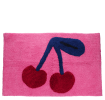 Pink bath mat with a cherry design in red and dark blue.
