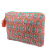 Pink quilted wash bag with orange and green flowers design.