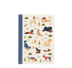 A6 notebook with illustrated dogs in a park scene on the cover.