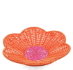 A shallow orange woven plastic basket with a flower-shaped rim and a pink centre.