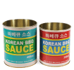 Two colourful Korean BBQ sauce storage tins