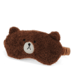 Brown plush teddy bear–shaped travel eye mask with embroidered facial features.