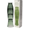 Stacked green glass tumblers placed beside box
