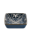 Blue ceramic square dish with white floral pattern interior