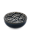 Round ceramic bowl with white wave pattern interior