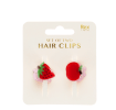 Set of two mini fruit-shaped hair claw clips in strawberry and apple designs displayed in retail card packaging.