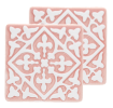 Set of two pink ceramic coaster with embossed pattern.