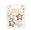 Gold and silver glitter star hair clips on display card.