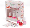 Unicorn-themed nail kit with nail polishes, nail file, stickers displayed beside illustrated retail packaging.