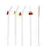 Four reusable glass drinking straws with colourful fruit toppers and cleaning brush