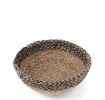 Round seagrass bowl with natural and black woven detail.