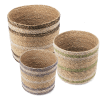 Set of three round seagrass baskets in assorted sizes.