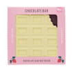 White chocolate bar-shaped notebook in pink packaging with strawberry-themed details.