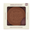Chocolate biscuit-shaped notebook with bite-mark detail, displayed in retail packaging.