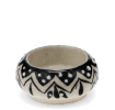 Round ceramic tealight holder with black zigzag pattern