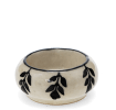 Round ceramic tealight holder with black leaf pattern 