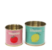 Decorative storage tins labelled "Spiced Tomatoes" and "Moroccan Lemons"