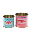 Ocean-themed decorative storage tins labelled "Ocean Crab" and "Lobster"