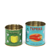 Decorative storage tins labelled "Pepper" and "Paprika" with illustrated peppers