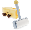 Banana-shaped holder with smiling face and lint roller