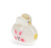 Bunny-themed travel toothbrush case with pink rabbit face 