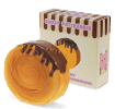 Chocolate-topped cromboloni squishy toy shown beside matching display box.