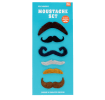 Self-adhesive moustache set with six novelty moustache styles on retail packaging..