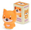 Orange dog-shaped squishy toy with smiling face, shown beside matching display box.