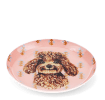 Round metal trinket tray featuring an illustrated brown dog with a decorative pattern.