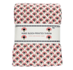 Hand block-printed throw with red floral pattern, folded in packaging.