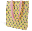 Yellow shopping bag with floral block-print pattern and matching pink carry handles.