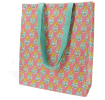 Pink shopping bag with floral block-print pattern and carry handles.
