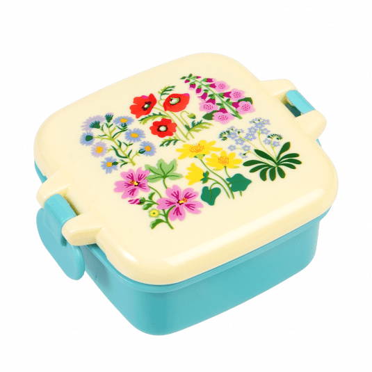 Turquoise snack pot with cream lid featuring wild flower pattern