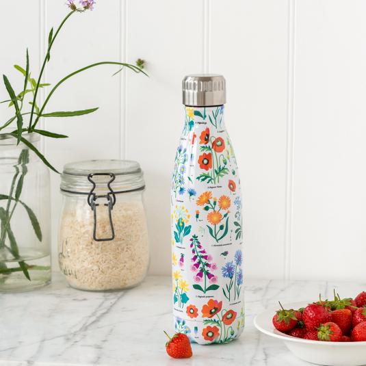 Medium size white stainless steel water bottle with silver lid featuring floral pattern