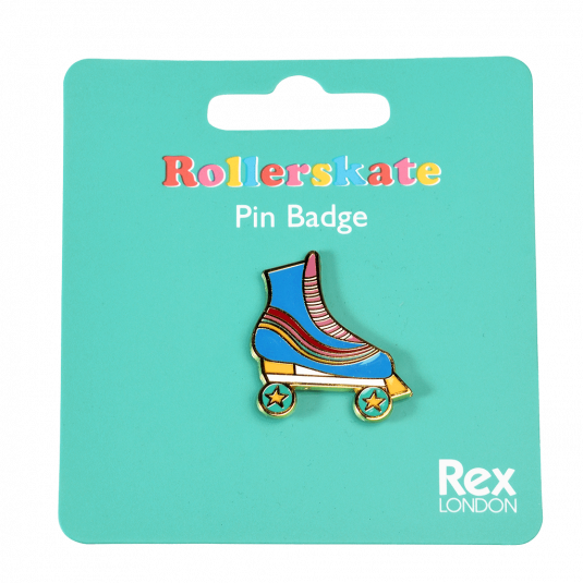 Roller skate pin badge attached to packaging