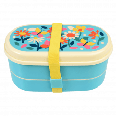 Light blue kids bento box with cream lid and middle tray plus yellow elastic strap featuring print of butterflies amongst flowers