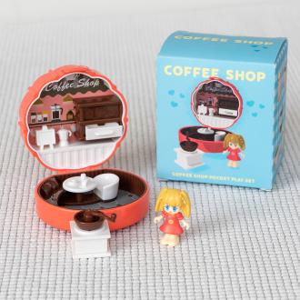 miniature coffee shop playset with packaging box in the background