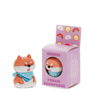 dog shaped pencil sharpener beside the box 