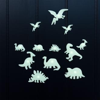 Various glowing dinosaur species on a black background