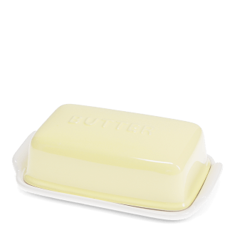 Rectangular butter dish with yellow lid embossed with the word 'BUTTER