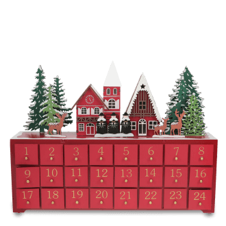 Wooden advent calendar with 24 red drawers numbered in gold, featuring snow-covered houses, trees, and reindeer