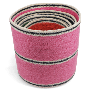 Stacked woven storage baskets in varying sizes and colours 