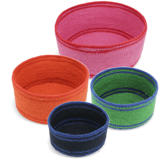 Four woven storage baskets in varying sizes and colours